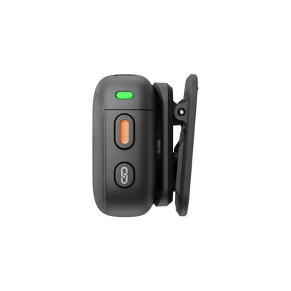 Black DJI Mic 3 transmitter with green and orange buttons on a white background