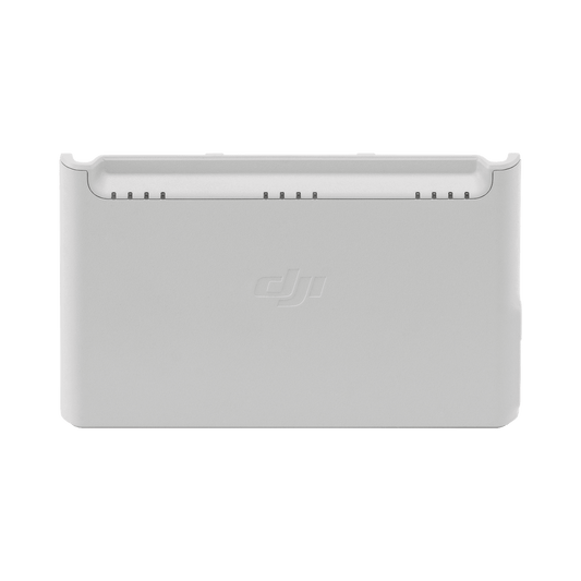 White electronic device with DJI logo on a white background
