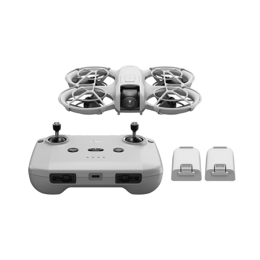 DJI Neo fly more combo White drone with controller and two batteries on a black background