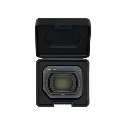 Camera lens with its cover open on a white background