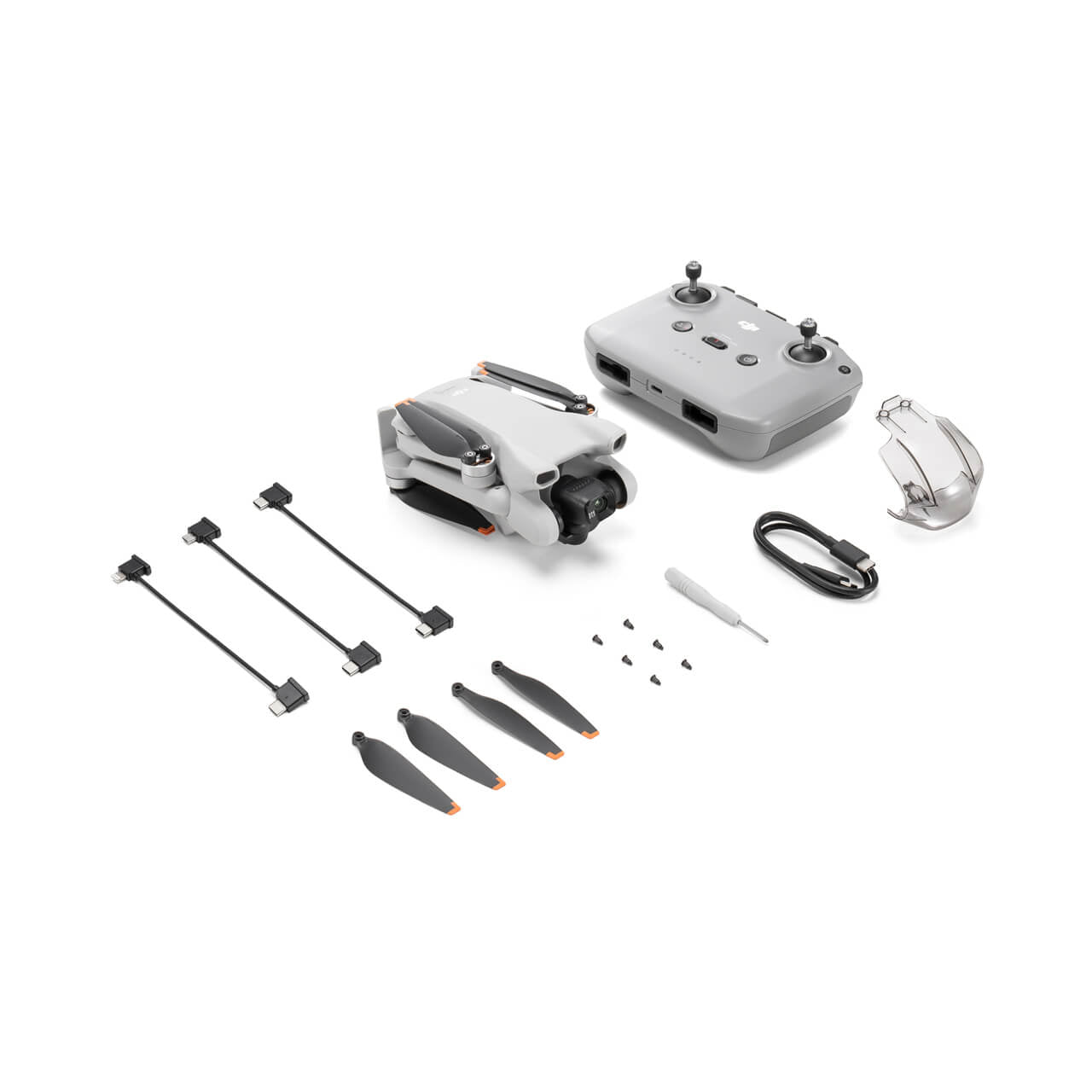 DJI Mini 3 drone and accessories on a white background