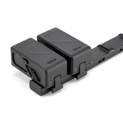 Black electronic device with multiple connectors on a white background