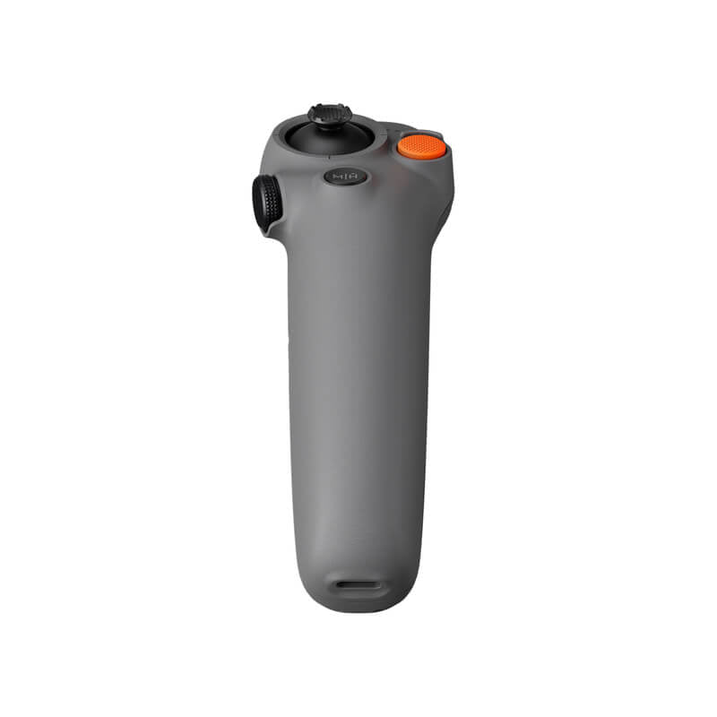 Gray handheld device with black and orange buttons on a white background