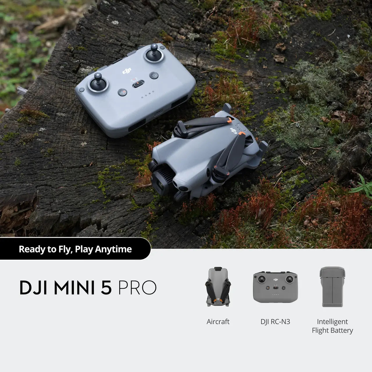 DJI Mini 5 Pro drone on a wooden surface with packaging and accessories.