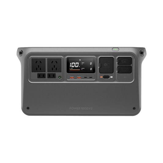 Power station with multiple outlets and display on a white background