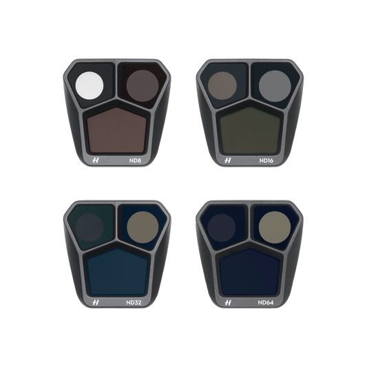 Four filter holders with different ND values on a black background