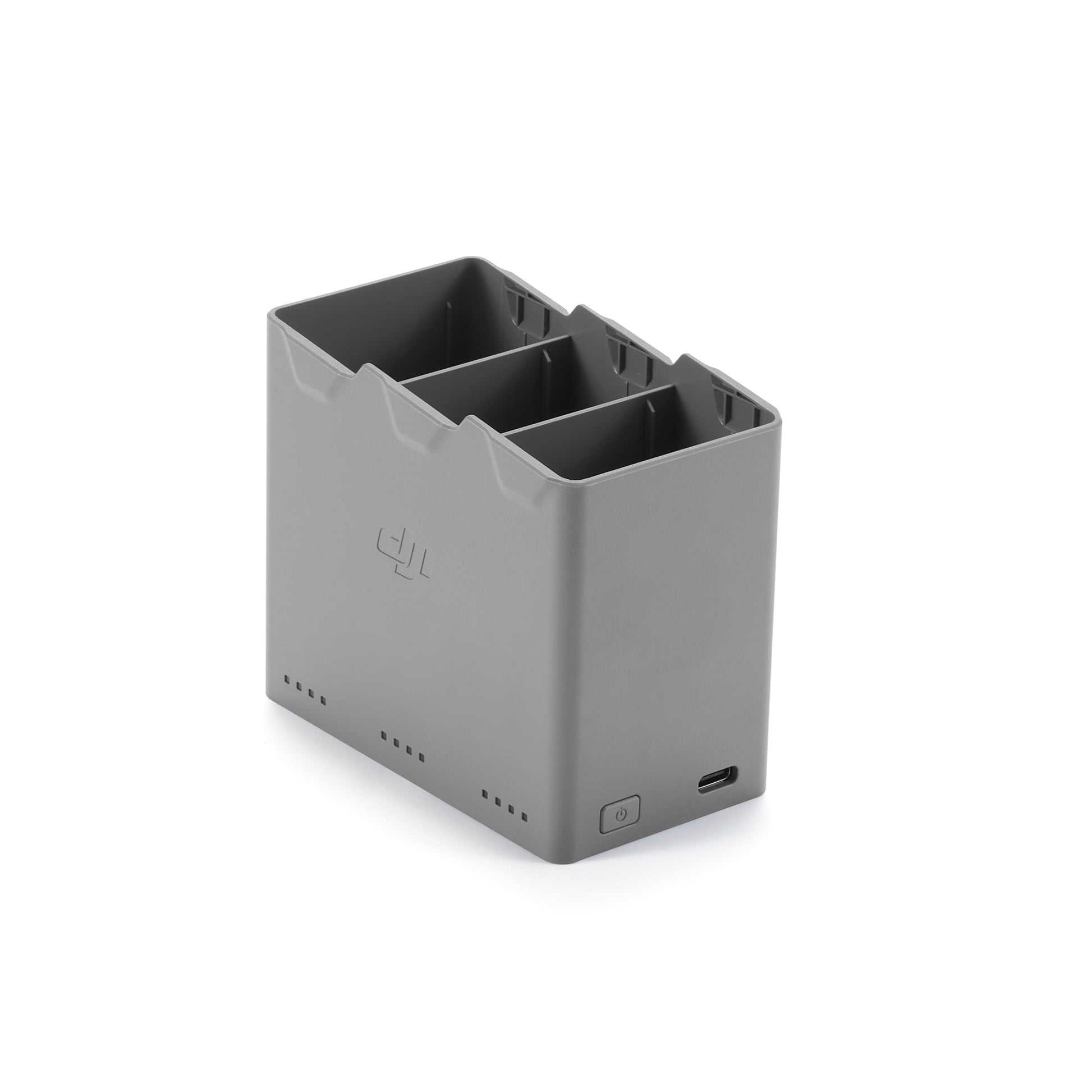 Gray battery charger with two slots on a white background
