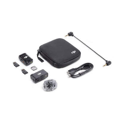 Collection of DJI Mic 2 accessories including a case, cable, and small electronic components on a white background.