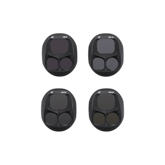 Four black rubber filters with numbers on a white background