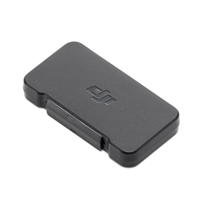 Black rectangular device with a logo on a white background
