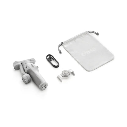 White handheld DJI Osmo Mobile 7 Smartphone Gimbal with accessories on a white background