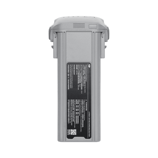 Gray battery pack with a label on a white background