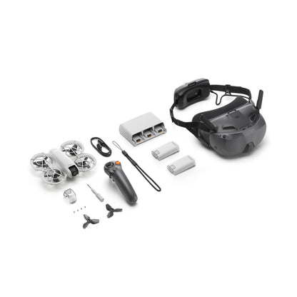 Collection of DJI Neo Motion drone parts including a helmet, remote control, and components on a white background