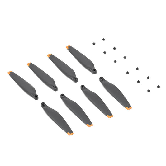 Set of gray cylindrical objects with orange accents on a white background