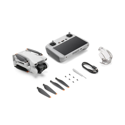 DJI Mini 3 drone and accessories on a white background