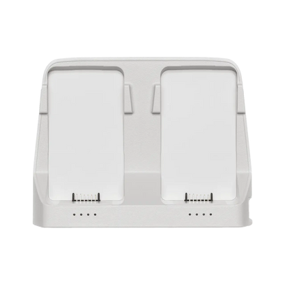 White electronic device with two screen-like components on a white background