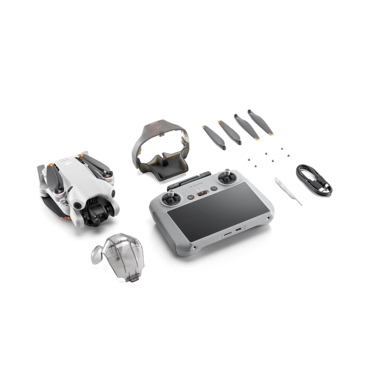 DJI Mini 4 drone and controller with accessories on a white background