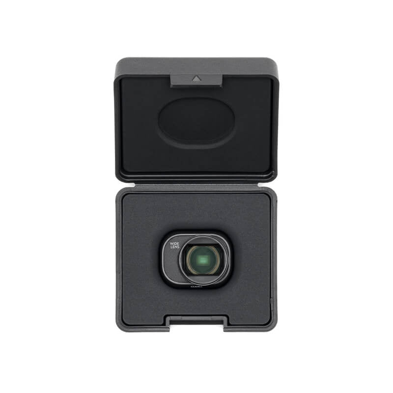 Black camera lens with protective cover on a white background