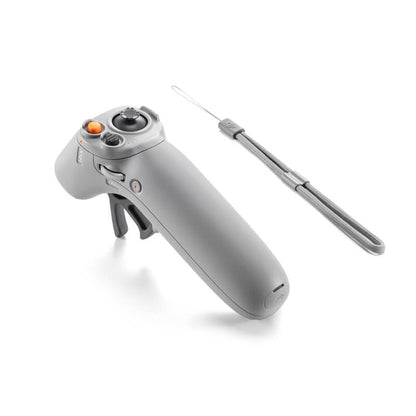 Gray electronic device with a needle on a white background
