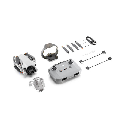 DJI Mini 4 pro drone and accessories on a white background