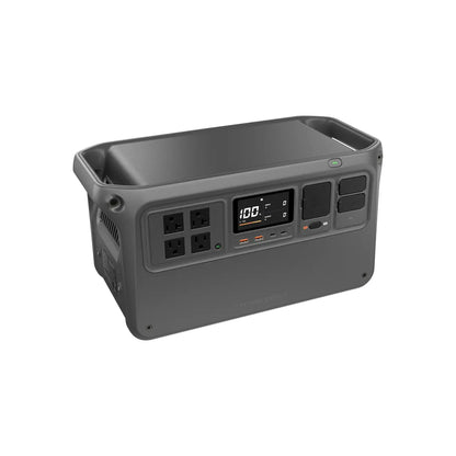 Portable power station with multiple outlets and a digital display on a white background