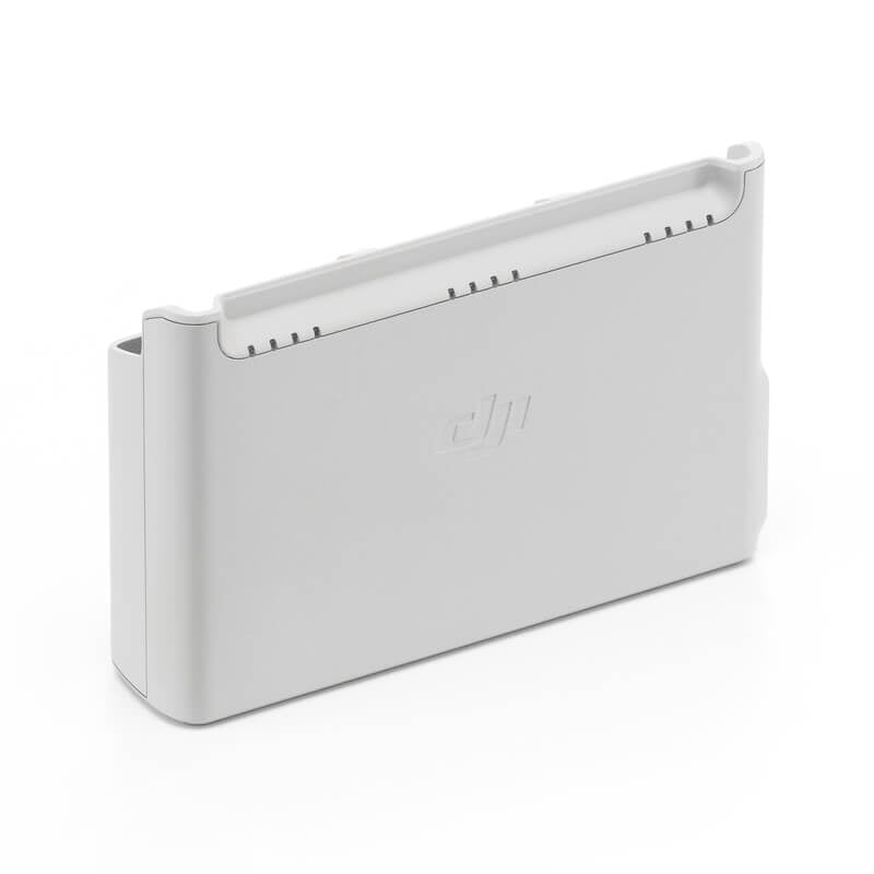 White electronic device with 'DJI' branding on a white background