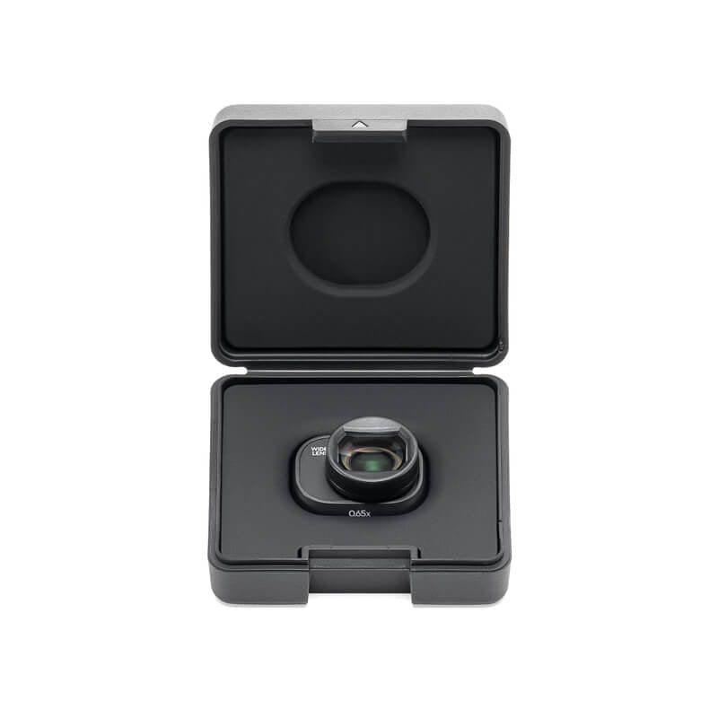 Black camera lens in a protective case on a white background