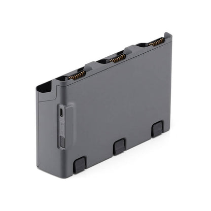 Gray rectangular battery pack with connectors on a white background