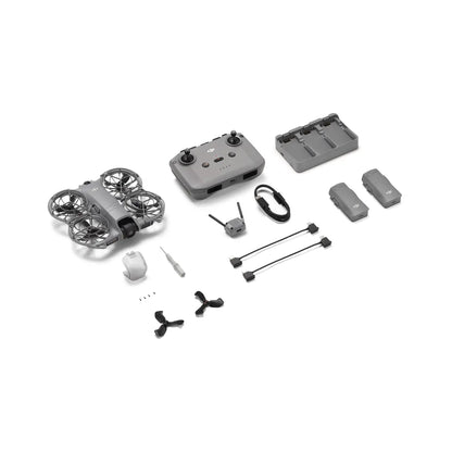 Collection of drone components including drone, controller, battery, and accessories on a white background