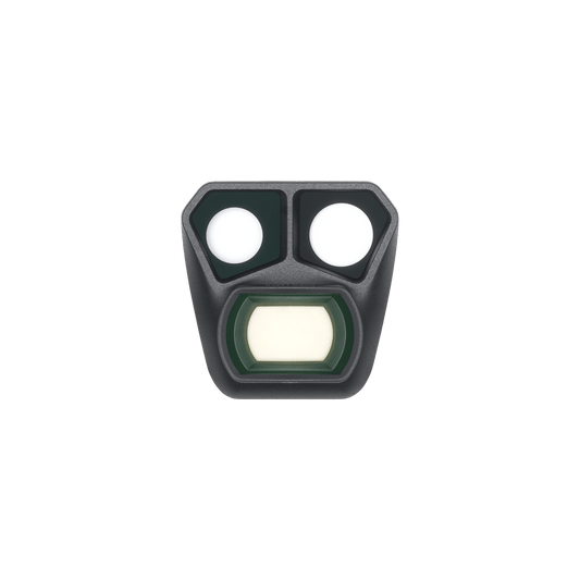 Black night vision device with two white lenses and a green filter on a black background