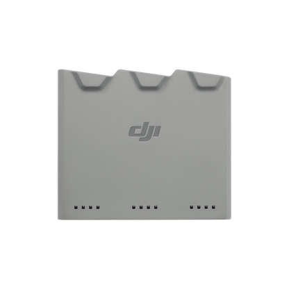 Gray rectangular charger with DJI logo on a white background