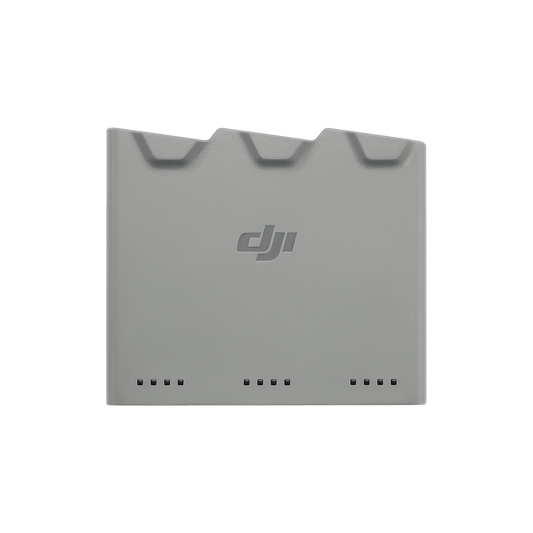 Gray rectangular charger with DJI logo on a white background