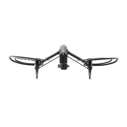 Black drone with green accents on a white background