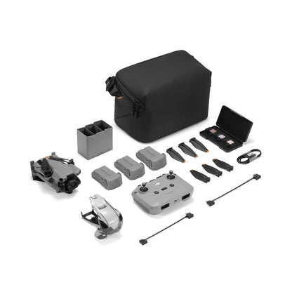 Collection of drone accessories including a black carrying case on a white background