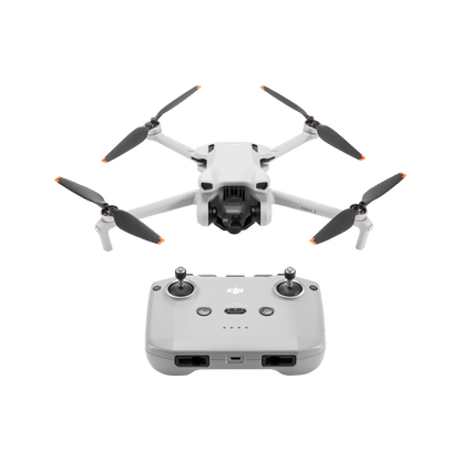 DJI mini 3 White drone with four propellers and a remote control on a black background